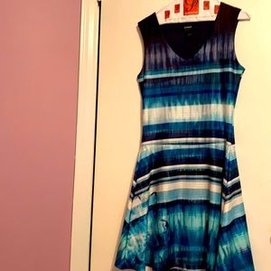 Desigual body fitting form dress with flared bottom in beautiful blues